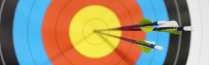 Archery target with arrow in the 10 ring