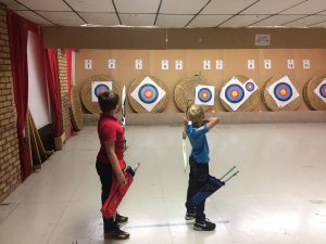 Jonathan and Jake, shooting for their Red Feathers.