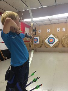 Jonathan and Jake, shooting for their Red Feathers.